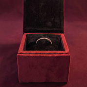 DEMAIN Diamonds Eternity Band Ring in 14k rose gold set with lab grown diamonds in red velvet jewelry box